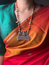 Load image into Gallery viewer, Statement coral comb bird necklace
