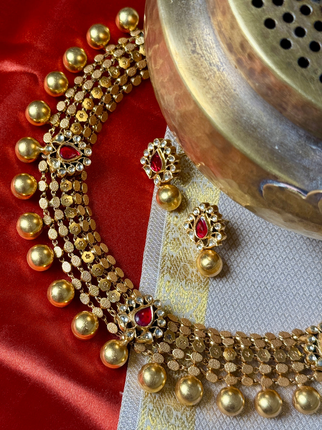 One of a kind gold polish kundan work statement necklace set